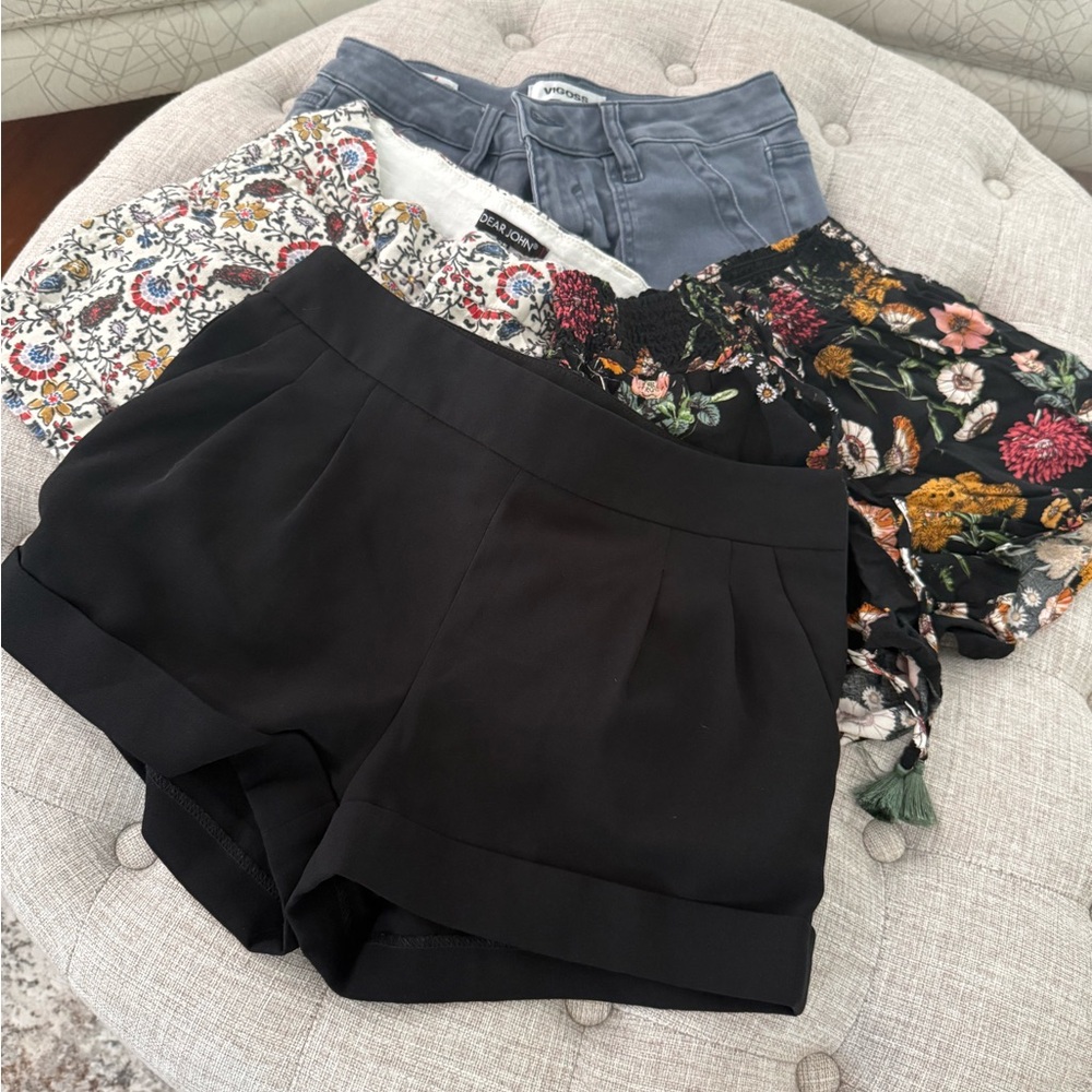 4 pair Women's Shorts. All size 25 except solid black express dress shorts 00